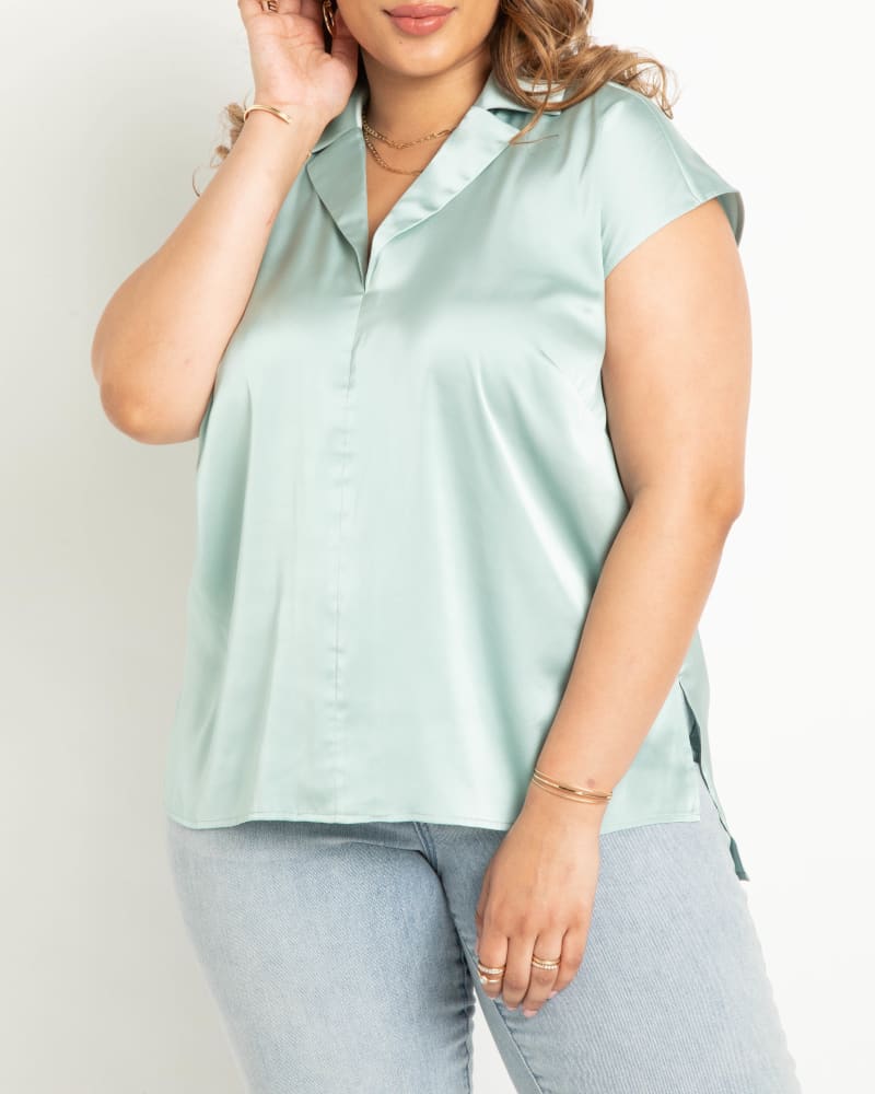 Front of a model wearing a size 24 Collared Satin Top- Seaglass in Seaglass by ELOQUII. | dia_product_style_image_id:283709